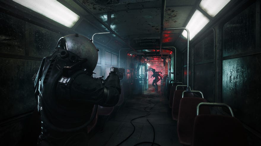 The space-suitted protagonist aims their pistol at a mutant at the end of an eery rail carriage.