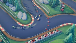 Circuit Superstars - ten open wheel cars race around a corner on a paved track.