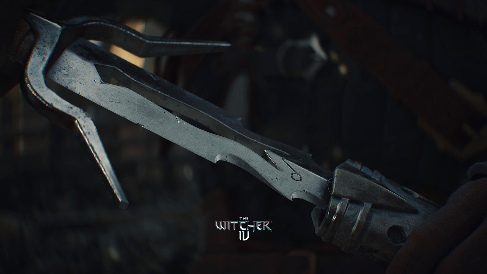 A close-up of the base of a sword blade being drawn from a sheath.