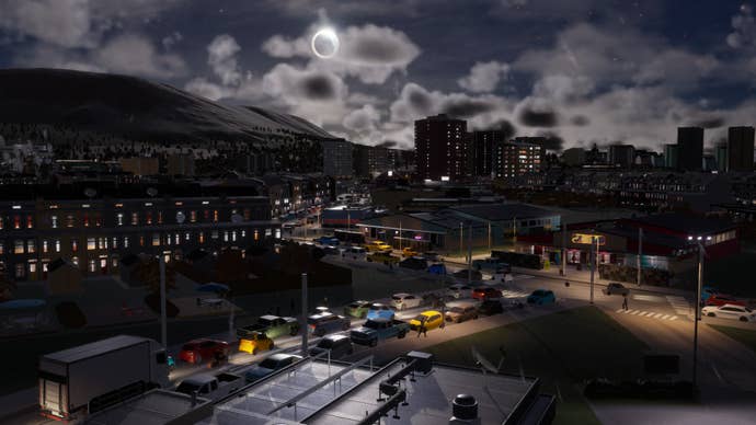 A traffic jam at night in Cities: Skylines 2.