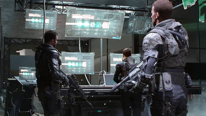 A group of soldiers look at operation screens in Call Of Duty Black Ops 3