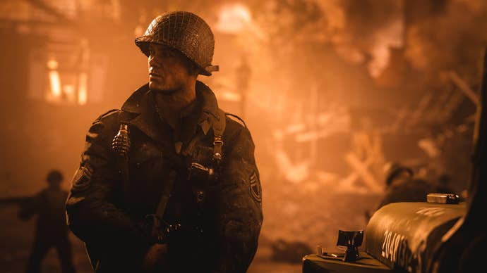 A worker looks mislaid against an orangish inheritance successful Call Of Duty WW2