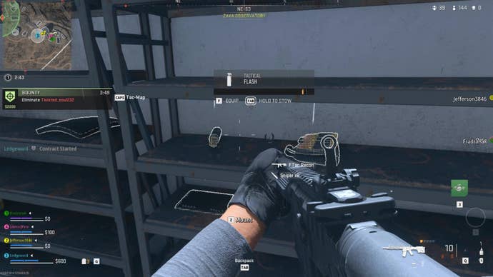 Looting a shelf in Warzone 2.