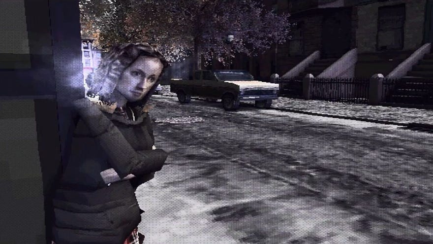 A woman waits in the winter snow on the streets of a US city.