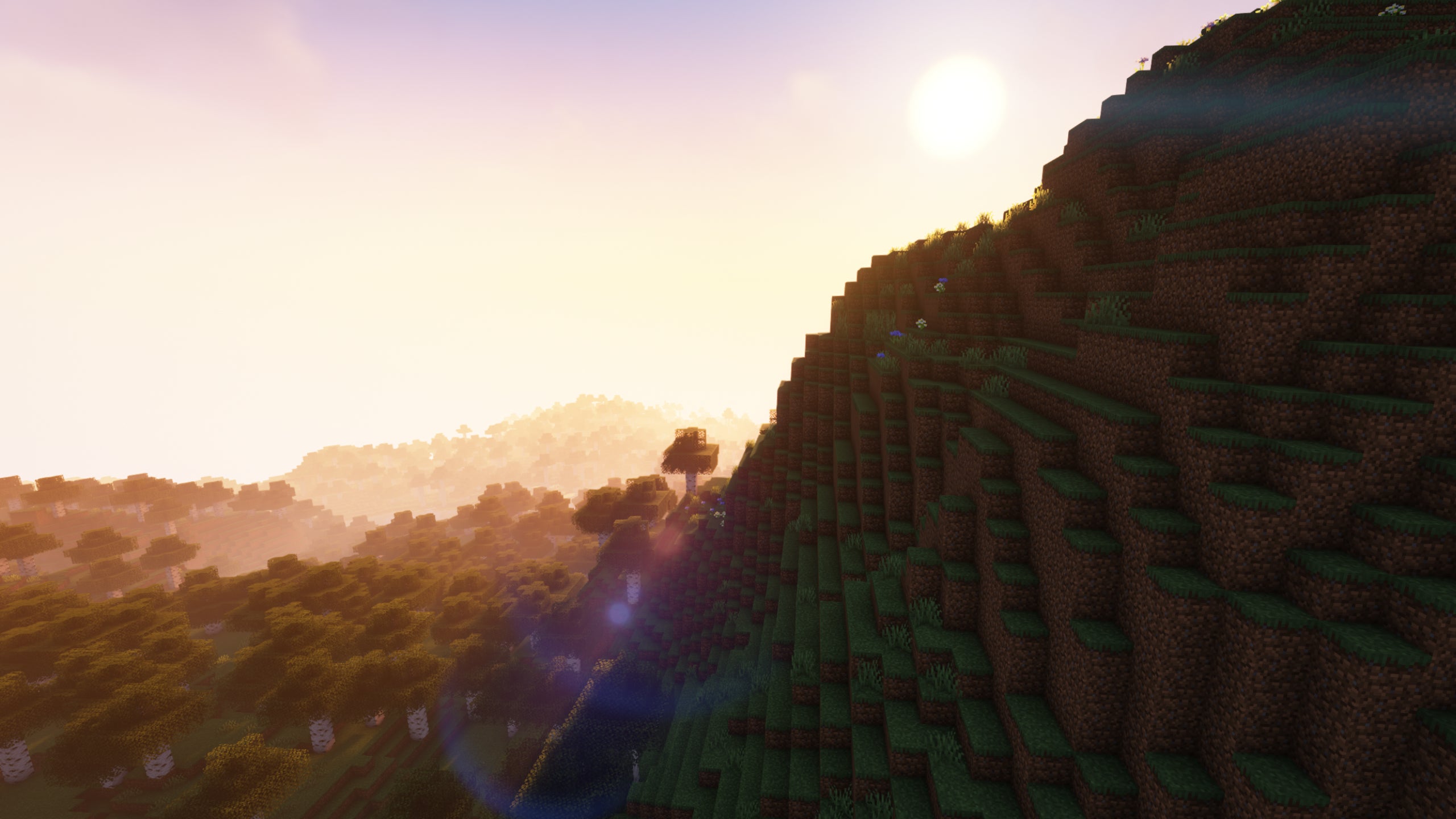 An extreme hills biome in Minecraft showcasing Complementary Shaders.