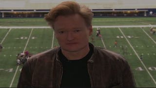 Clueless Gamer Conan O'Brien plays games on giant stadium screen