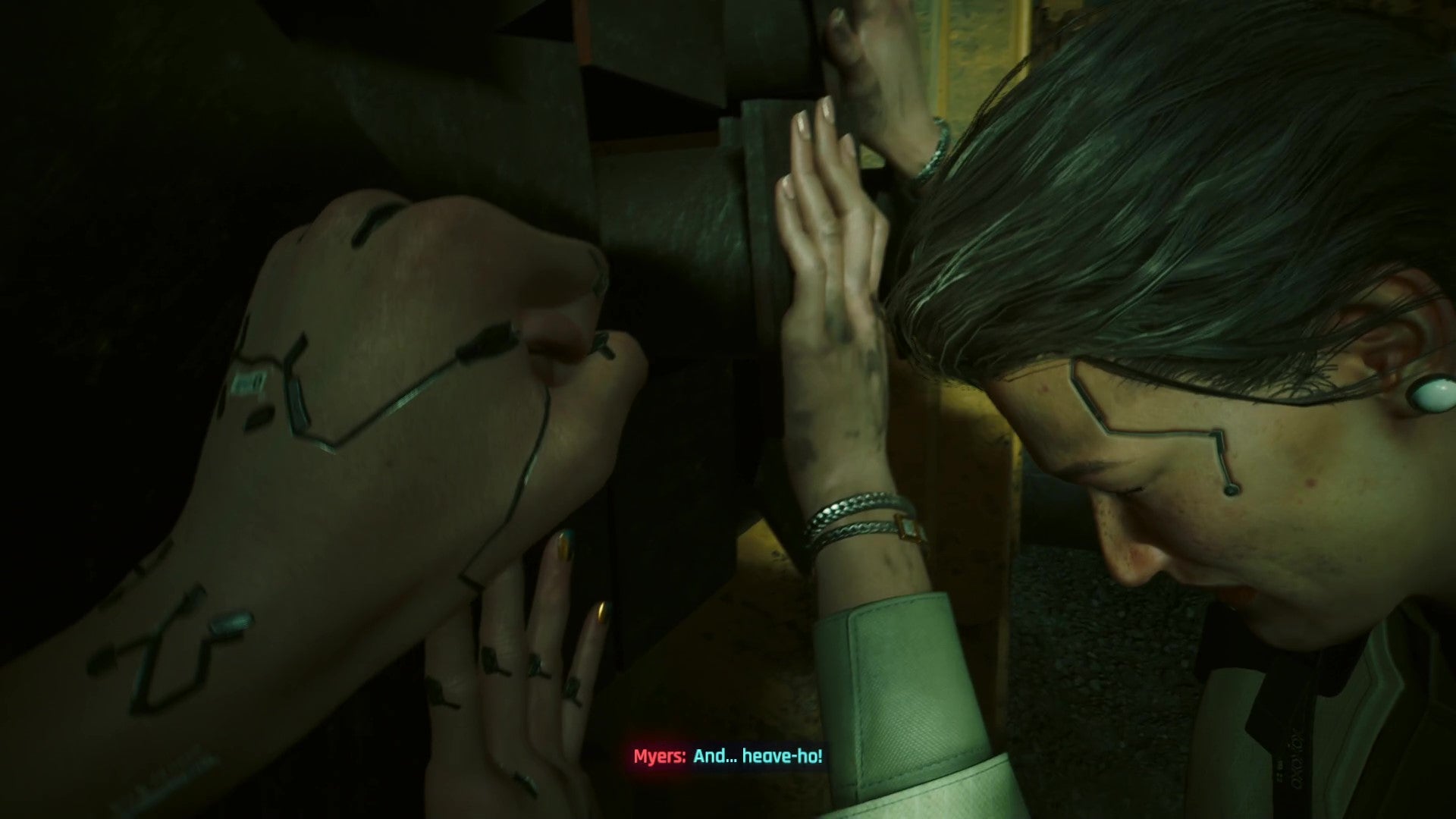 Myers and V push a heavy cart together to free up their route through the underground tunnels.