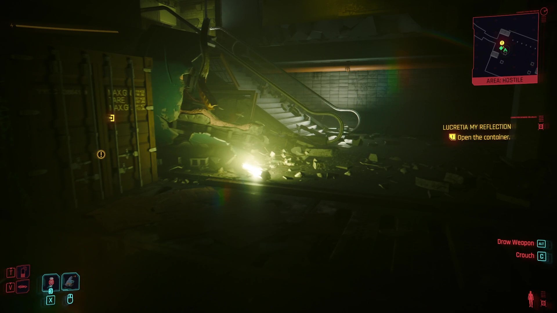 A shipping container under a rubble-covered staircase. - 4