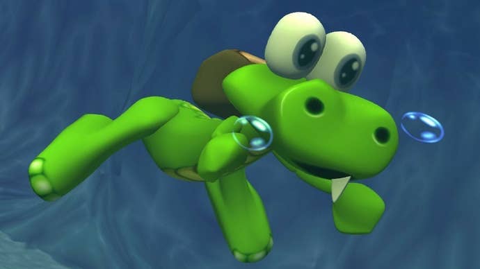Screenshot from the Croc: Legend of the Gobbos remaster showing Croc swimming through an underwater cave.