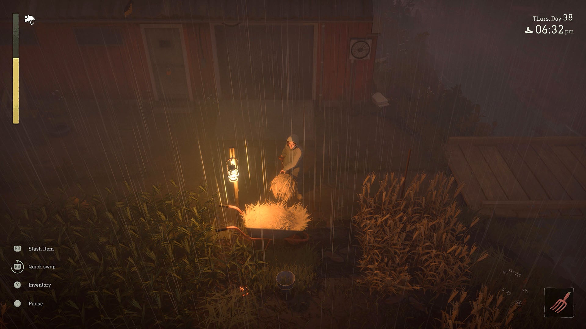 A farmer in a raincoat fills up a composter in Crop