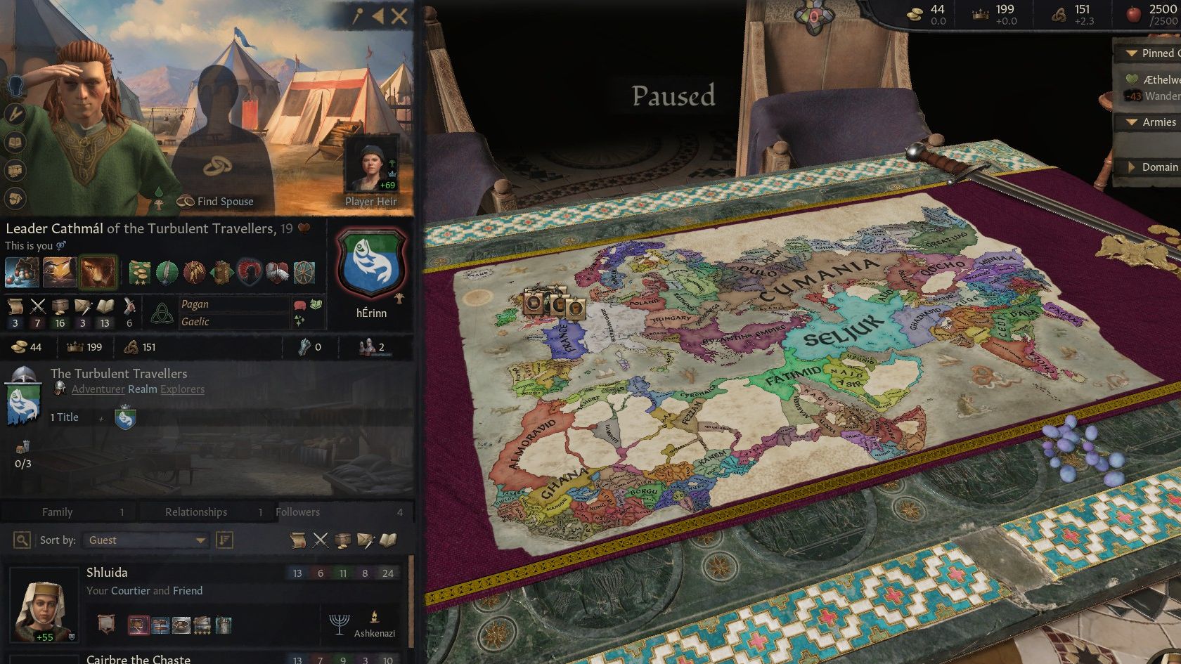 The map of the world is spread out as Cathmál looks on. - 1