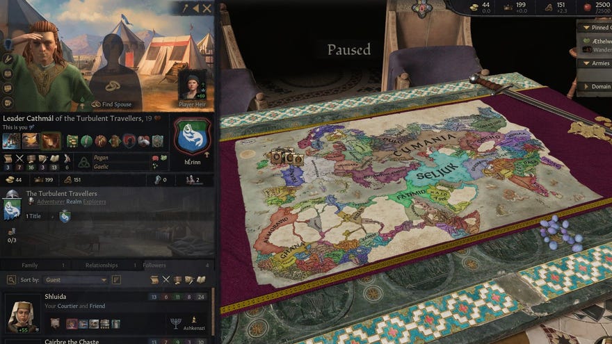 The map of the world is spread out as Cathmál looks on.