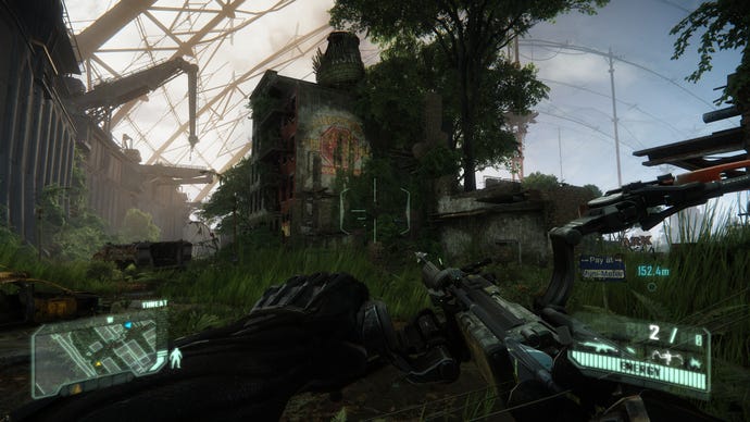 An old brick building covered by trees and surrounded by overgrown grass in Crysis 3.