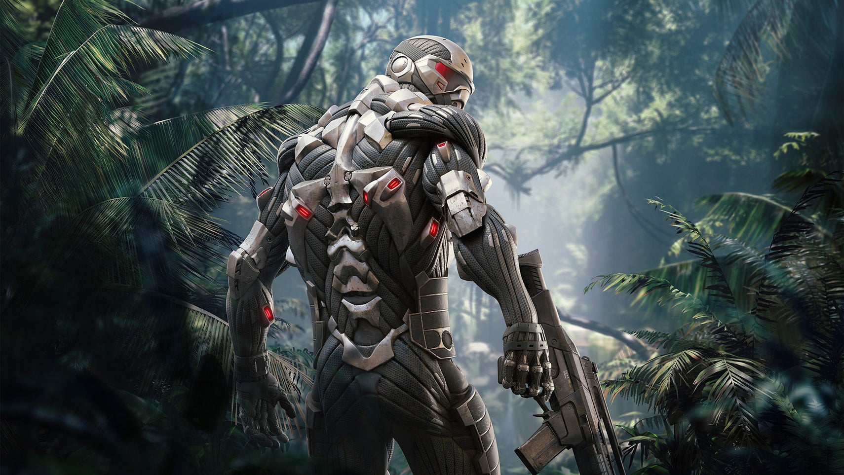 A person wearing a futuristic suit holding a gun while stood in a jungle setting in key art for Crysis. - 1