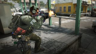 A counter-terrorist fires an SMG off-screen in Counter-Strike: Global Offensive.