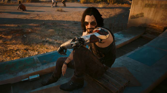 Cyberpunk’s Johnny Silverhand addresses the player in a sunny basketball court.