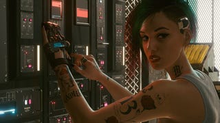 Judy hacks a server in a Cyberpunk 2077 screenshot.