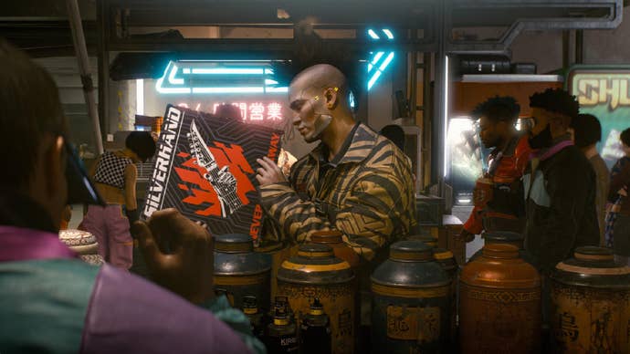A character looking at a Samurai record in Cyberpunk 2077.
