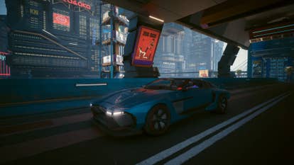 V cruising successful an autodriven car with Johnny Silverhand successful Cyberpunk 2077.