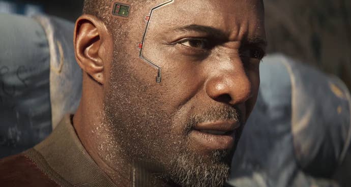 A close-up of Idris Elba’s digital face as Solomon Reed in Cyberpunk 2077: Phantom Liberty’s cinematic trailer.