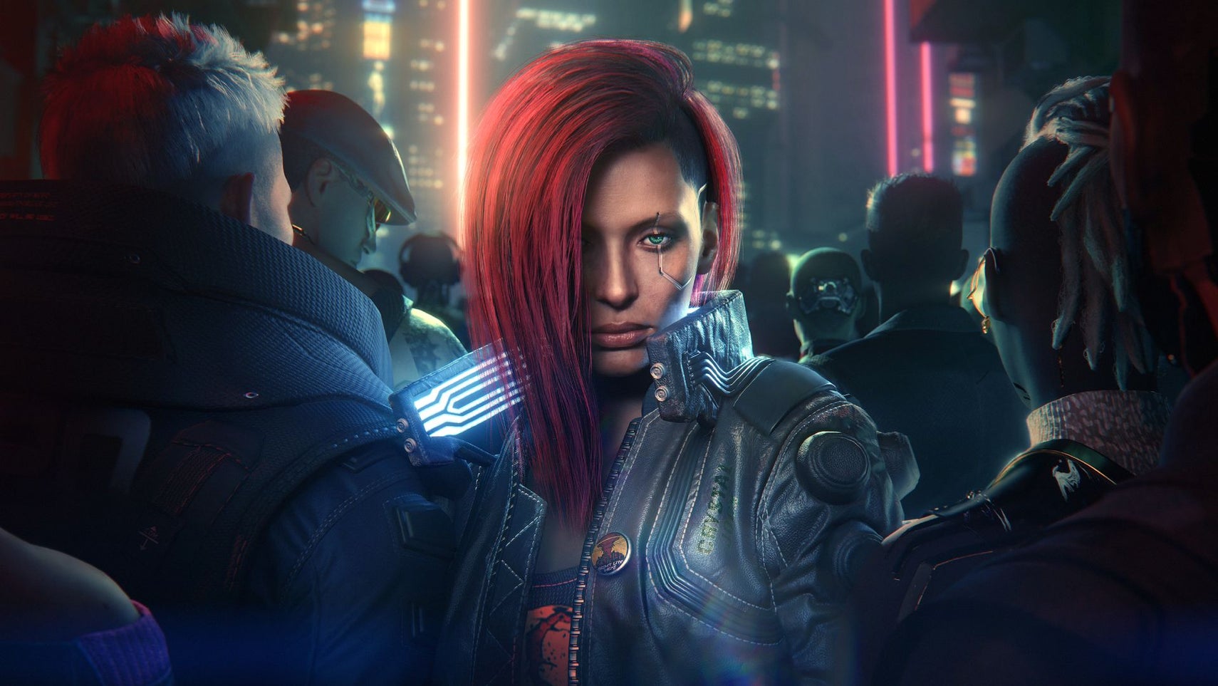 A red-haired woman in a futuristic cyberpunk world stands in the middle of a crowd staring at the camera. She has a glowing neon colour and some subtle but visible cybernetic implants on her face, around her eye. She's V from Cyberpunk 2077.