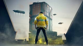 A Cyberpunk 2077 screenshot showing a male character in a bright yellow jacket with his back to the camera. A tower looms in the distance and several large angular vehicles fly overhead.