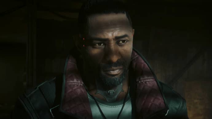 Idris Elba stares wistfully at something offscreen in Cyberpunk 2077’s Phantom Liberty expansion