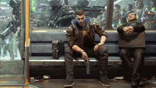 Promotional art for Cyberpunk 2077 showing the male version of protagonist V riding Night City's metro while a businessman slumps asleep beside him.