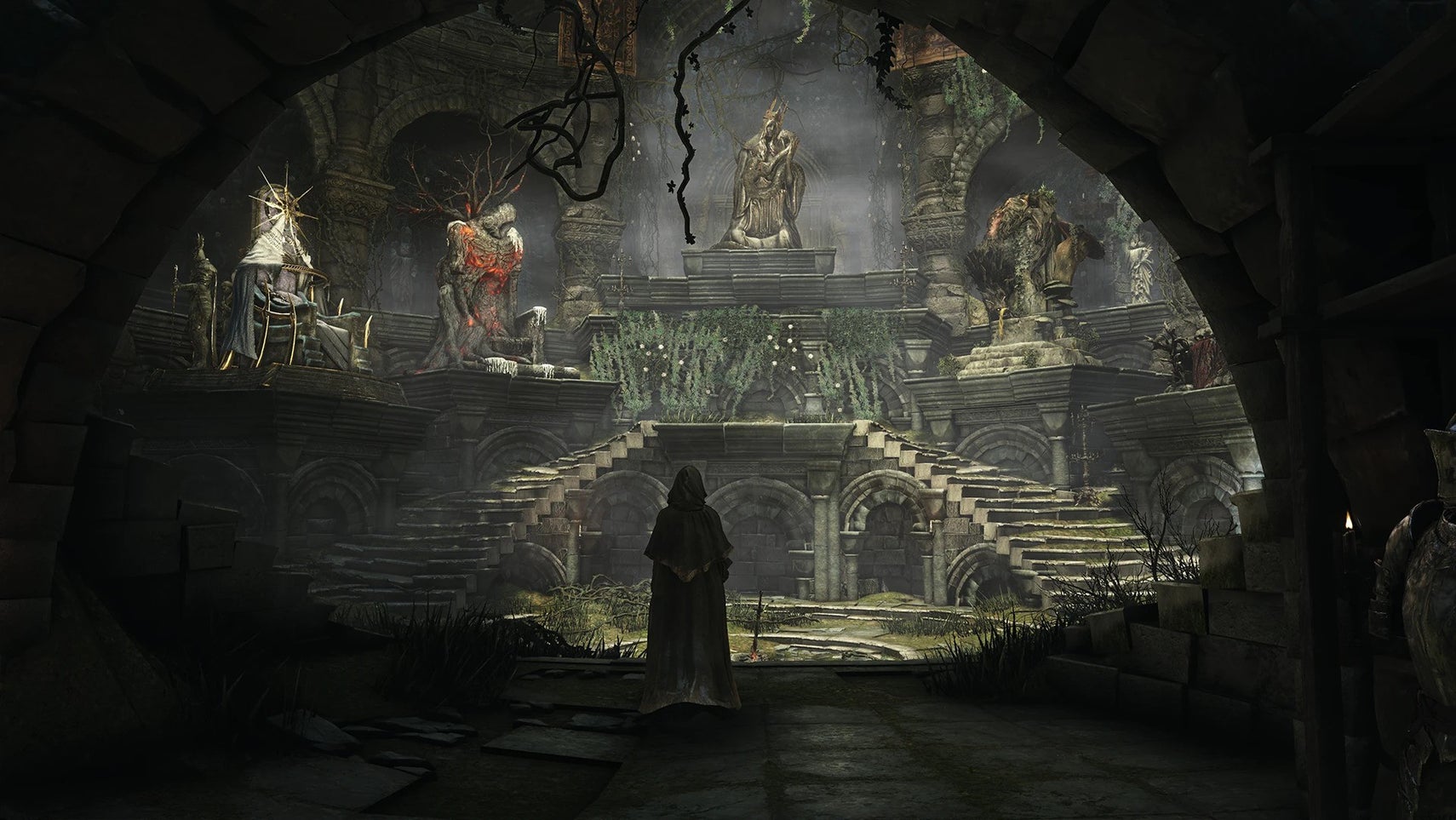A person wearing a hood is stood in a sanctuary with stone statues of various figures on pedestals displayed around it in Dark Souls Archthrones. - 1