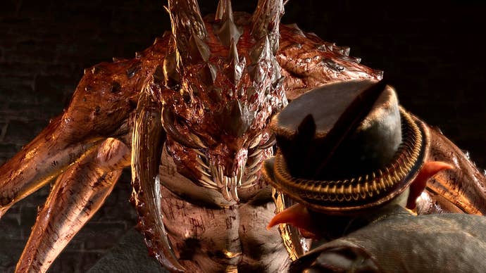 A huge, spiny, tusked, toothed monstrosity faces the camera. Facing it and looking up from beneath is a small, top-hatted character with pointy ears. It’s Baldur’s Gate 3’s demon butler looking upon the Slayer.