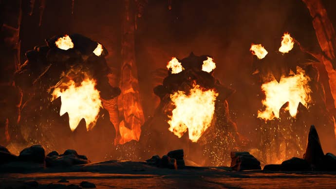 Three rocky faces with fire coming out from their mouths and eyes in a trailer for a new Darksiders game.