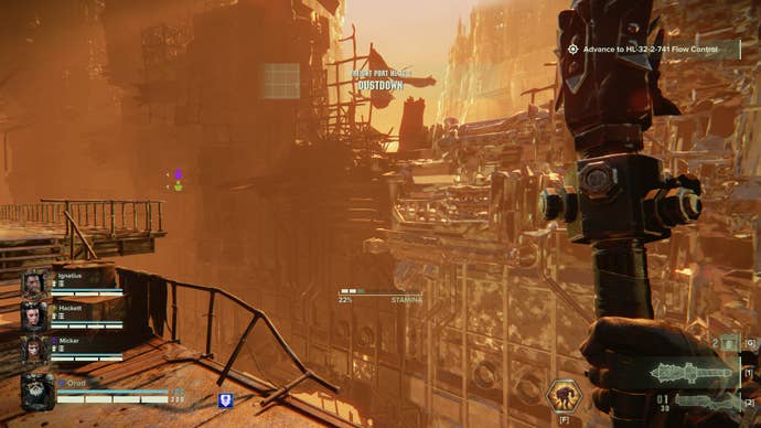 Darktide review - looking out over a rare exterior area in a mission, with a sandy yellow hue, holding a club