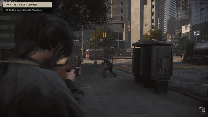 Aiming a rifle at a zombie in The Day Before.