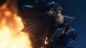 DC Heroes United promo shot featuring Batman mini foregrounded against an explosion