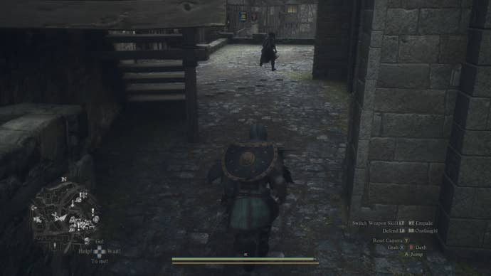 The player in Dragon’s Dogma 2 chases after a brown-cloaked figure in Vernworth.