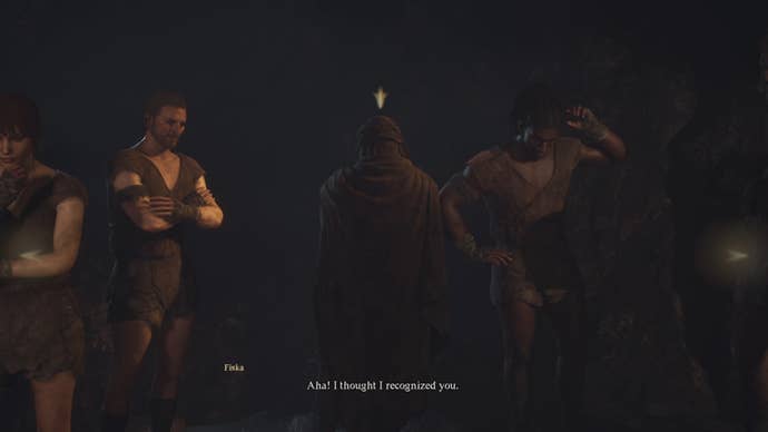 The character selection screen at the beginning of Dragon’s Dogma 2, showing a line of prisoners in a jail cell, the central one cloaked and with their back turned to the camera.