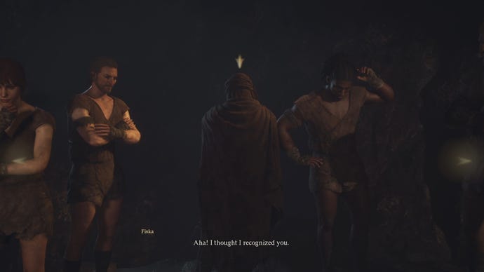 The character selection screen at the beginning of Dragon's Dogma 2, showing a line of prisoners in a jail cell, the central one cloaked and with their back turned to the camera.
