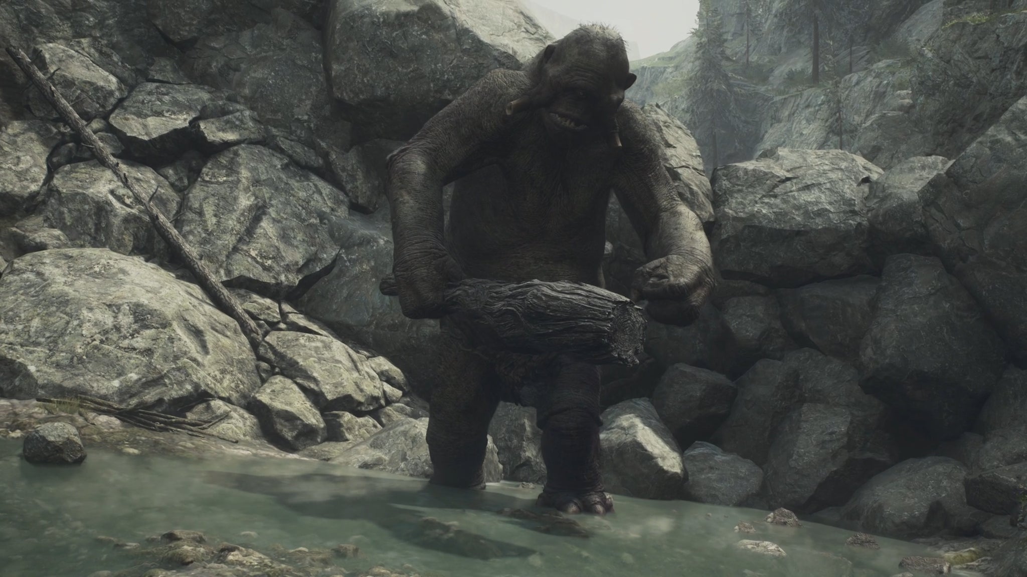 A cyclops awakens in front of a blocked passage in Dragon's Dogma 2. - 8