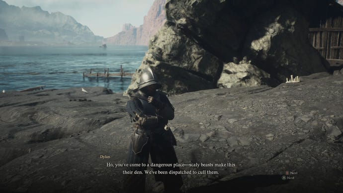 The player in Dragon's Dogma 2 speaks to a guard named Dylan on the beach.