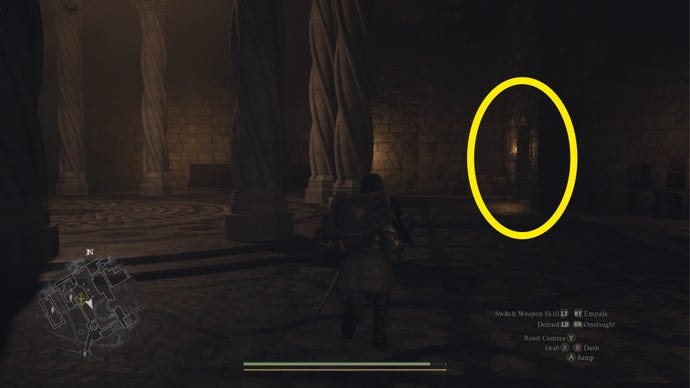 The player runs through the Guardhouse in Vernworth Castle in Dragon's Dogma 2 towards a side passage annotated with a yellow circle.