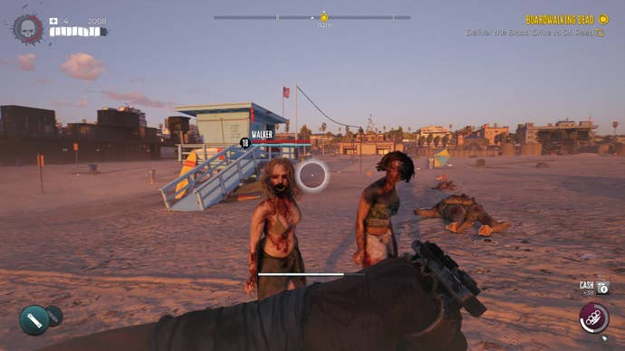 Two zombies shamble towards the player on Venice Beach in Dead Island 2