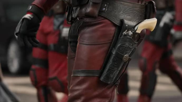 A close-up of a version of Deadpool’s legs in Deadpool & Wolverine, he’s walking and has a cowboy gun in a holster.