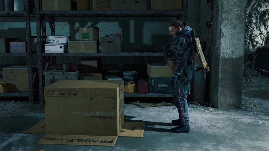 Sam stares at a box in the Death Stranding Director’s Cut trailer.