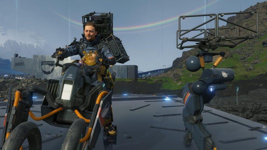 Sam rides a bike with a buddy bot in tow in Death Stranding Director’s Cut