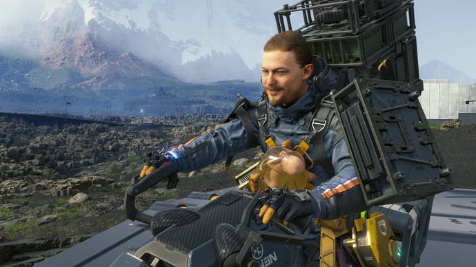 Sam and BB smile at the camera on their motorbike in Death Stranding