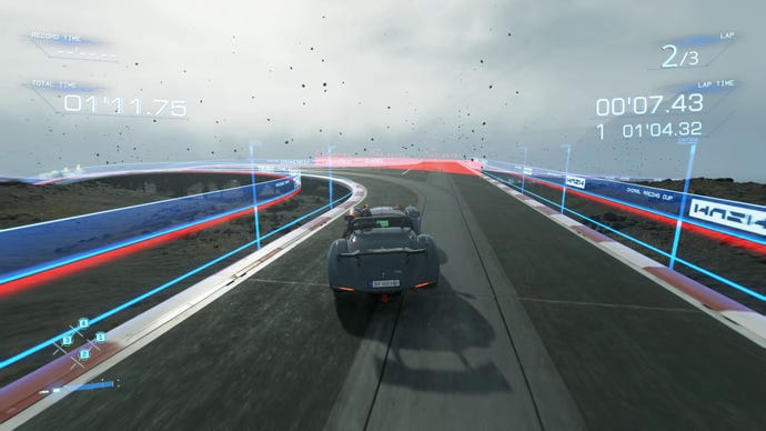 Sam drives a dark blue car on the race track in Death Stranding Director’s Cut