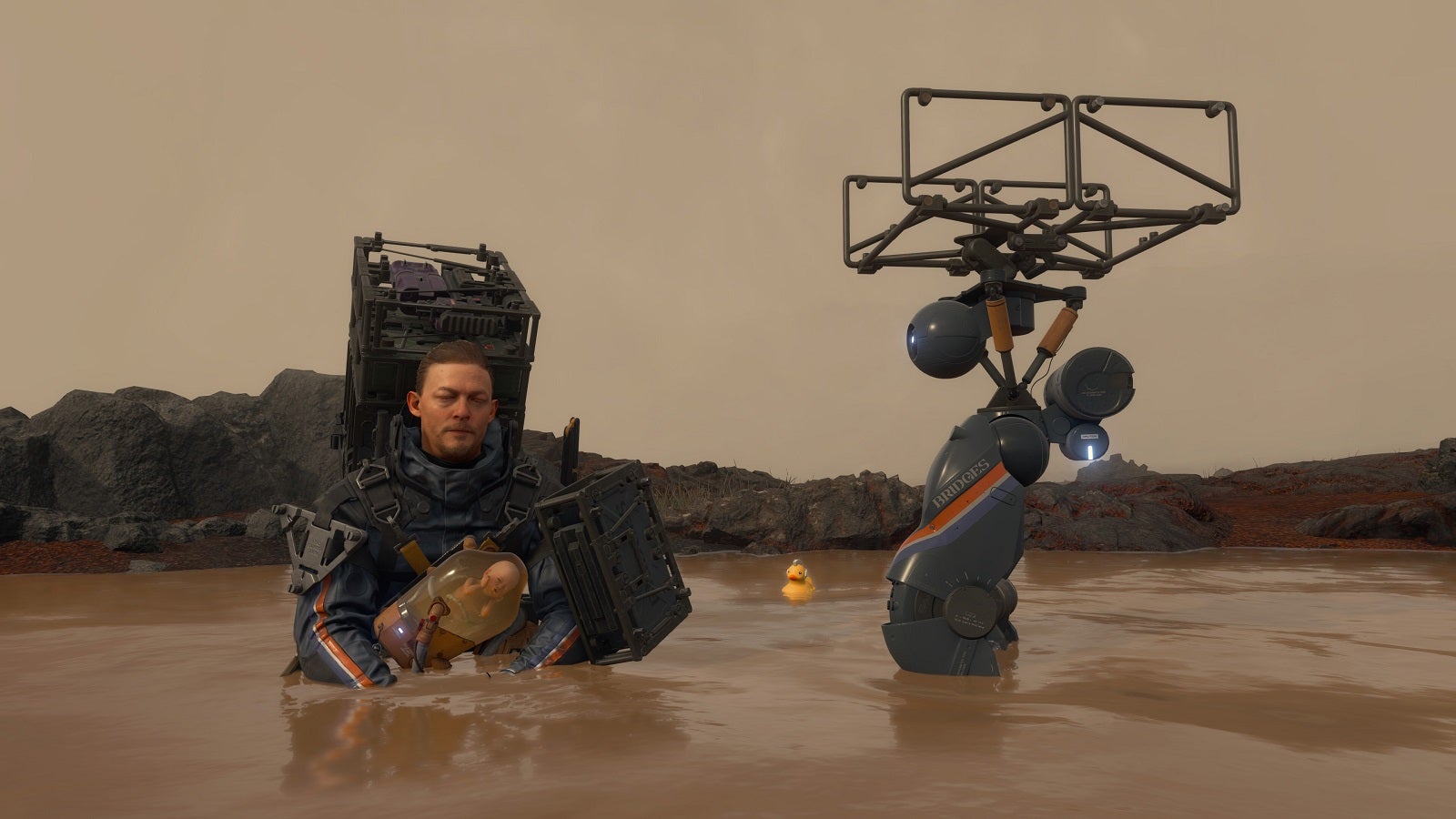 Norman Reedus' character waist-deep in murky brown water in Death Stranding. Yuck.