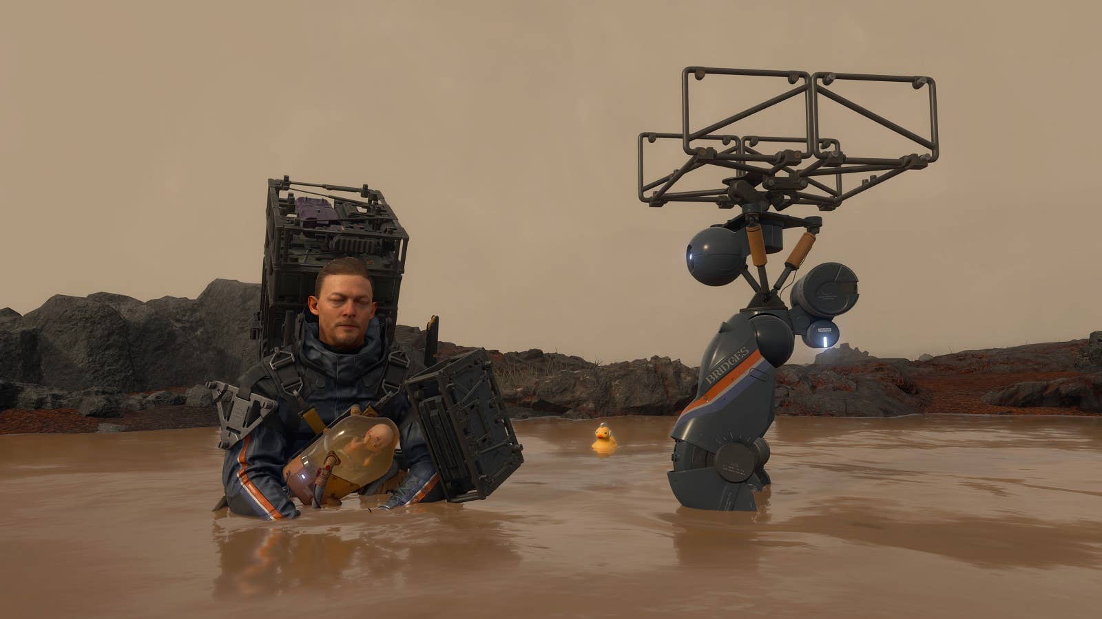 Norman Reedus' character waist-deep in murky brown water in Death Stranding. Yuck.