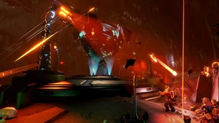 A still of Deep Rock Galactic's Industrial Sabotage mode, featuring a giant pyramid robot firing missies at our intrepid dwarves.