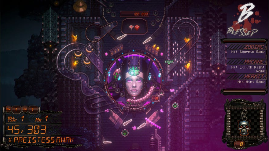 One of the pinball tables in DEMON’S TILT. There’s a menacing face in the middle